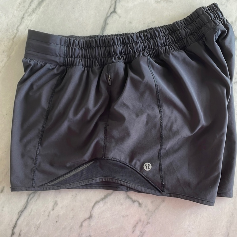 Black 4 inch hotty hot shorts. Mid rise.
